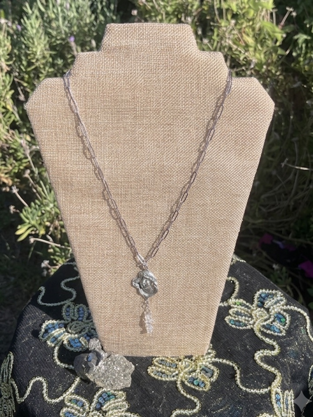 Silver Paperclip Chain Necklace Features Maiden Pendant and Crystal.